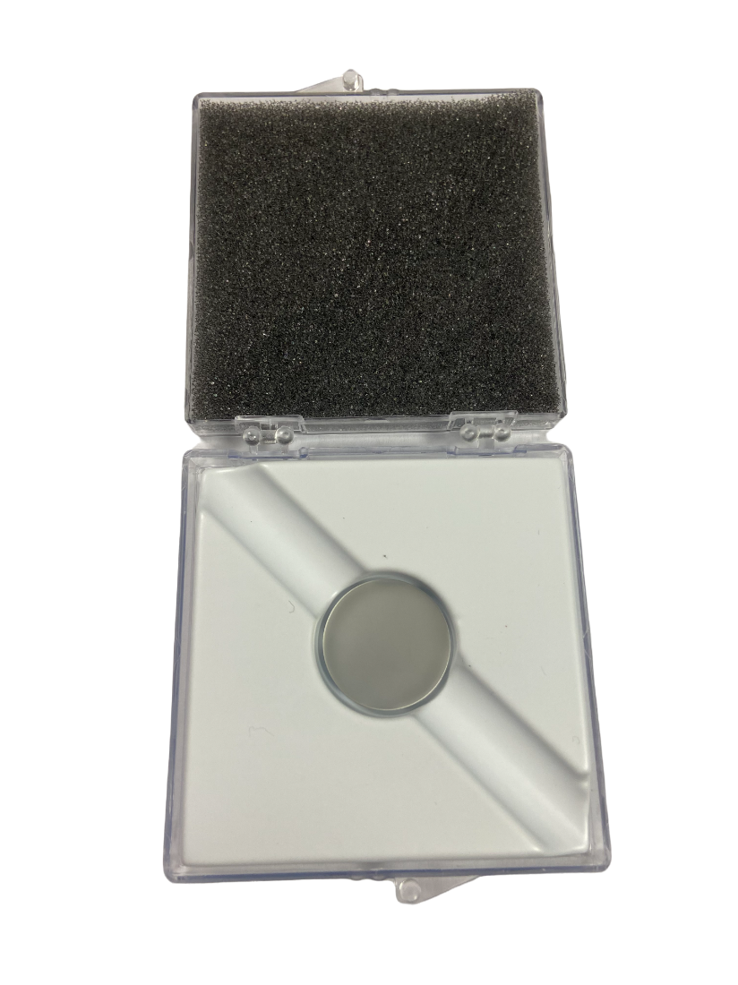 Photo of a round Aluminium Sample in a box HORIBA (2)
